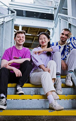 Students sat on a step