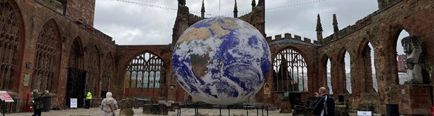 cathedral with a hanging earth in the middle