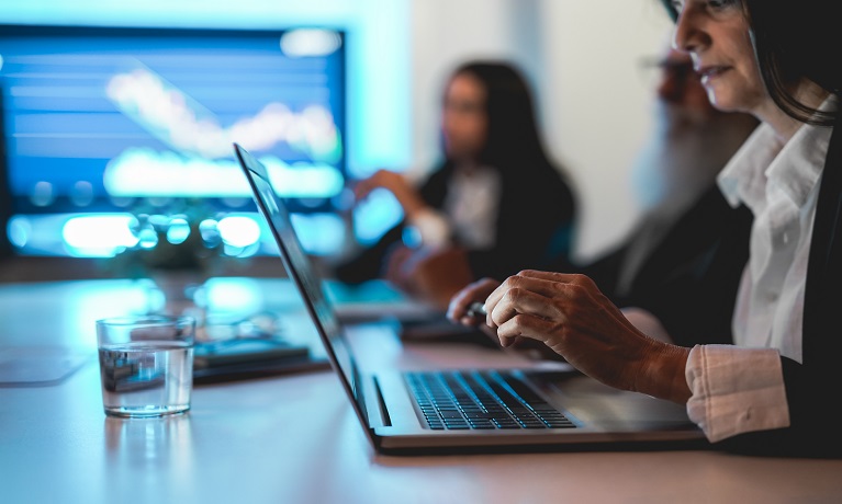 Business team worker doing stock market analysis inside hedge fund office