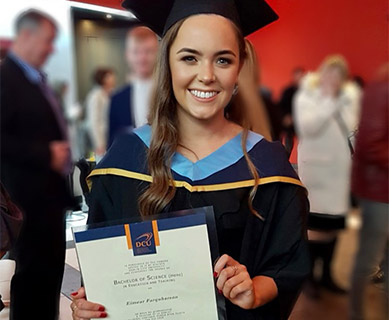 Eimear in a graduation cap and robe