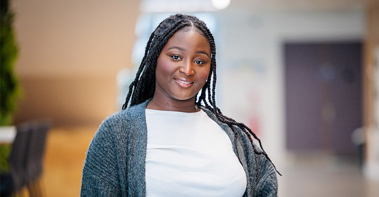 A portrait of Michelle smiling