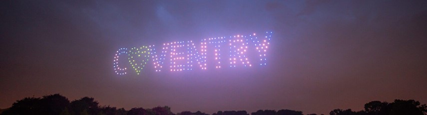 The word Coventry in lights in the sky