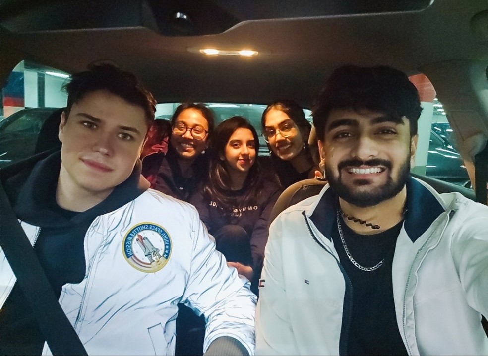Group of Coventry students in a car