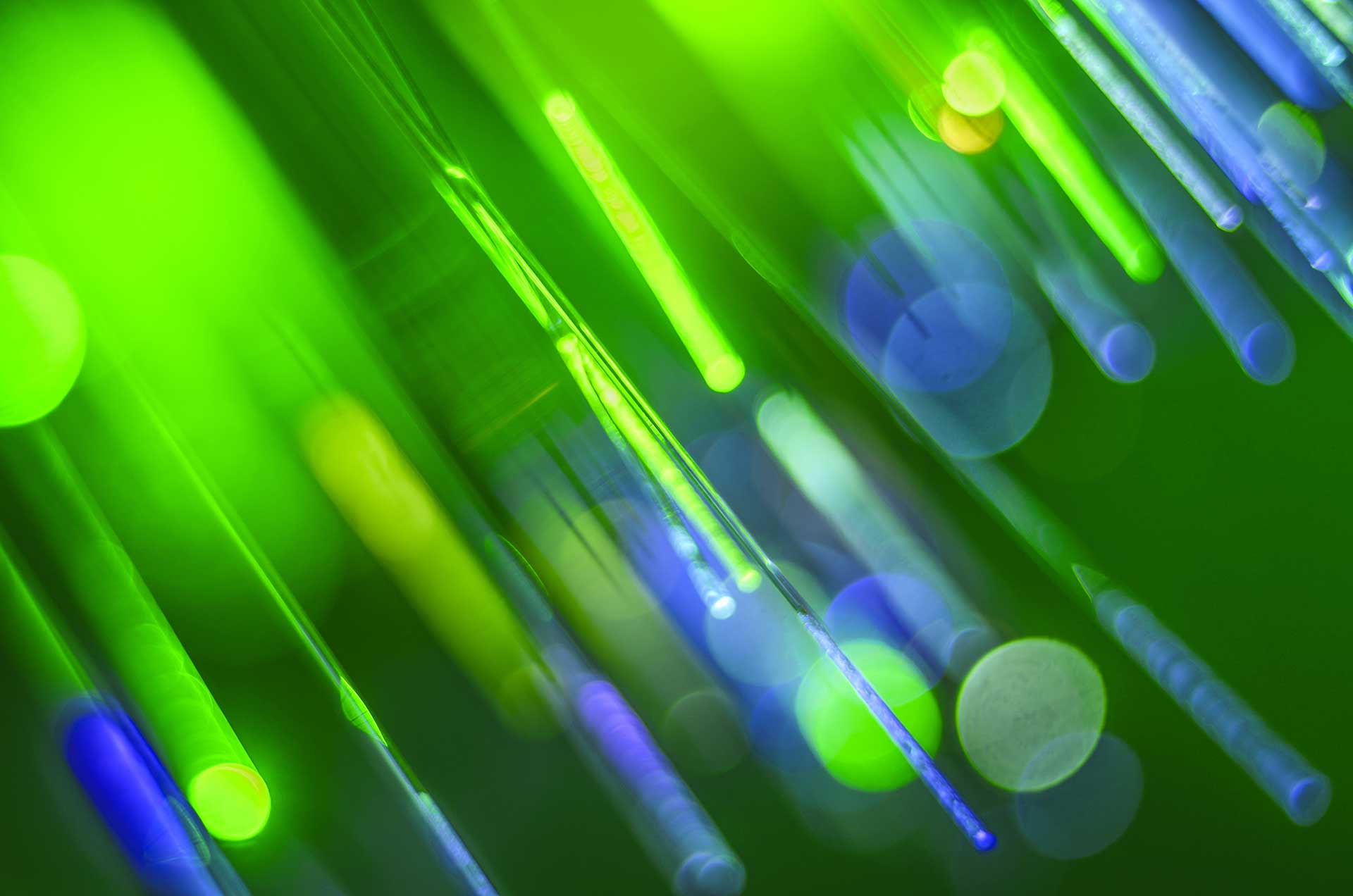 Abstract background with a smooth gradient transitioning from purple at the top to blue at the bottom.