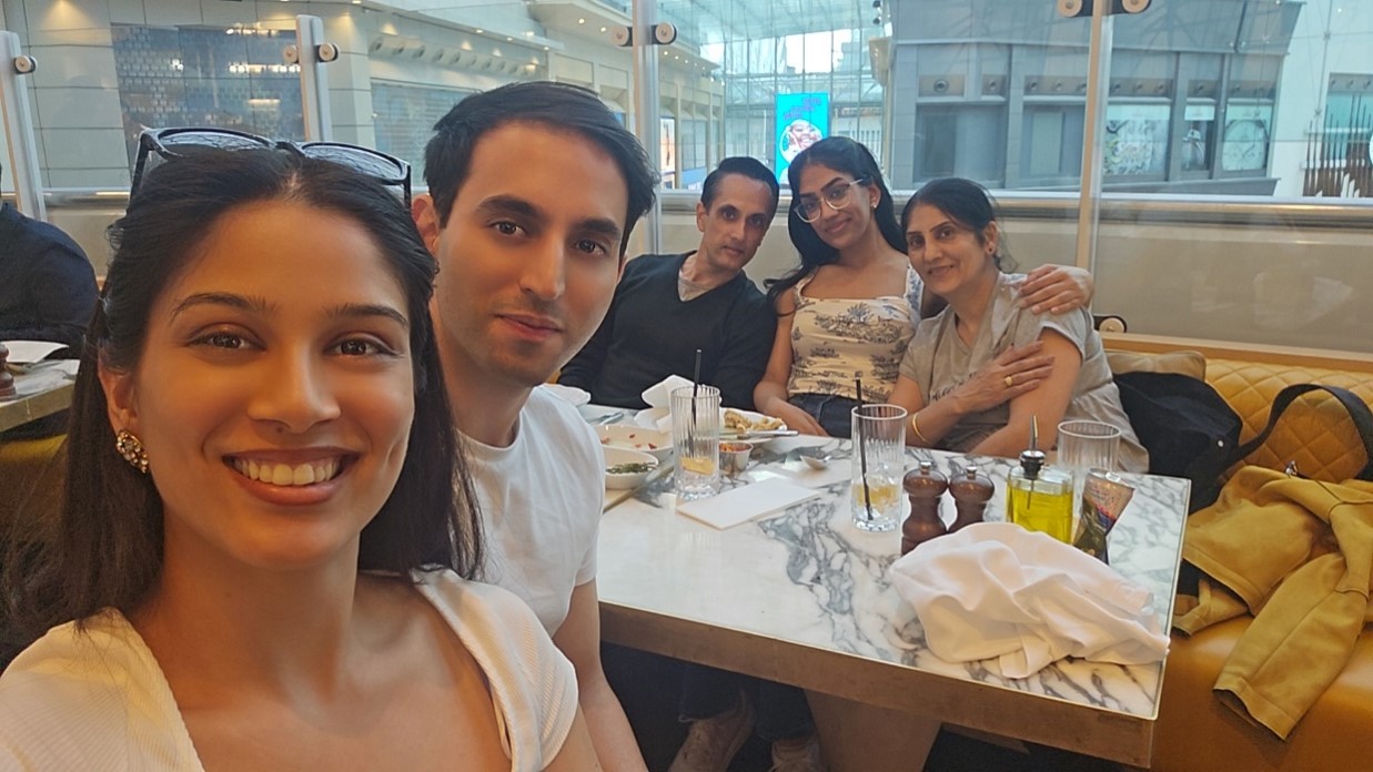 Family in a restaurant having drinks