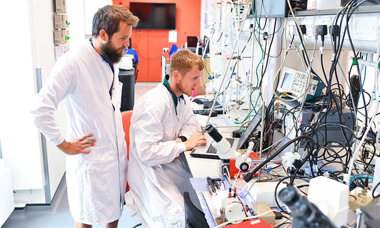 Two researchers working in a laboratory