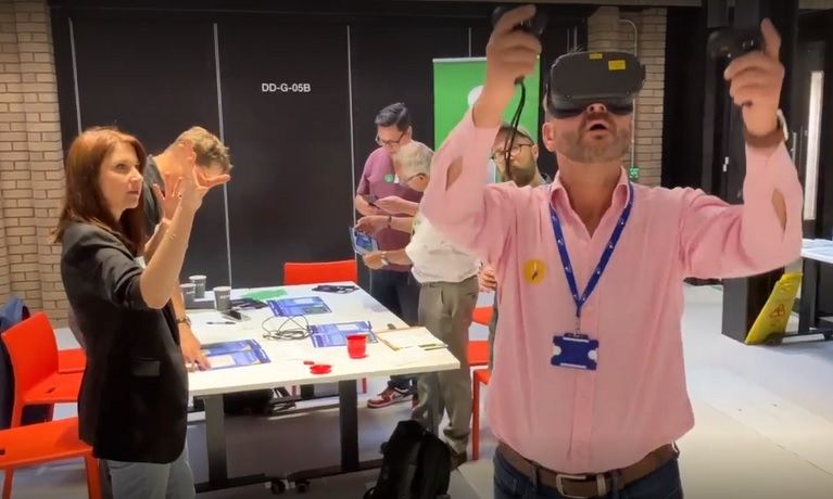 A participant at the Unconventional Convention wearing a VR headset