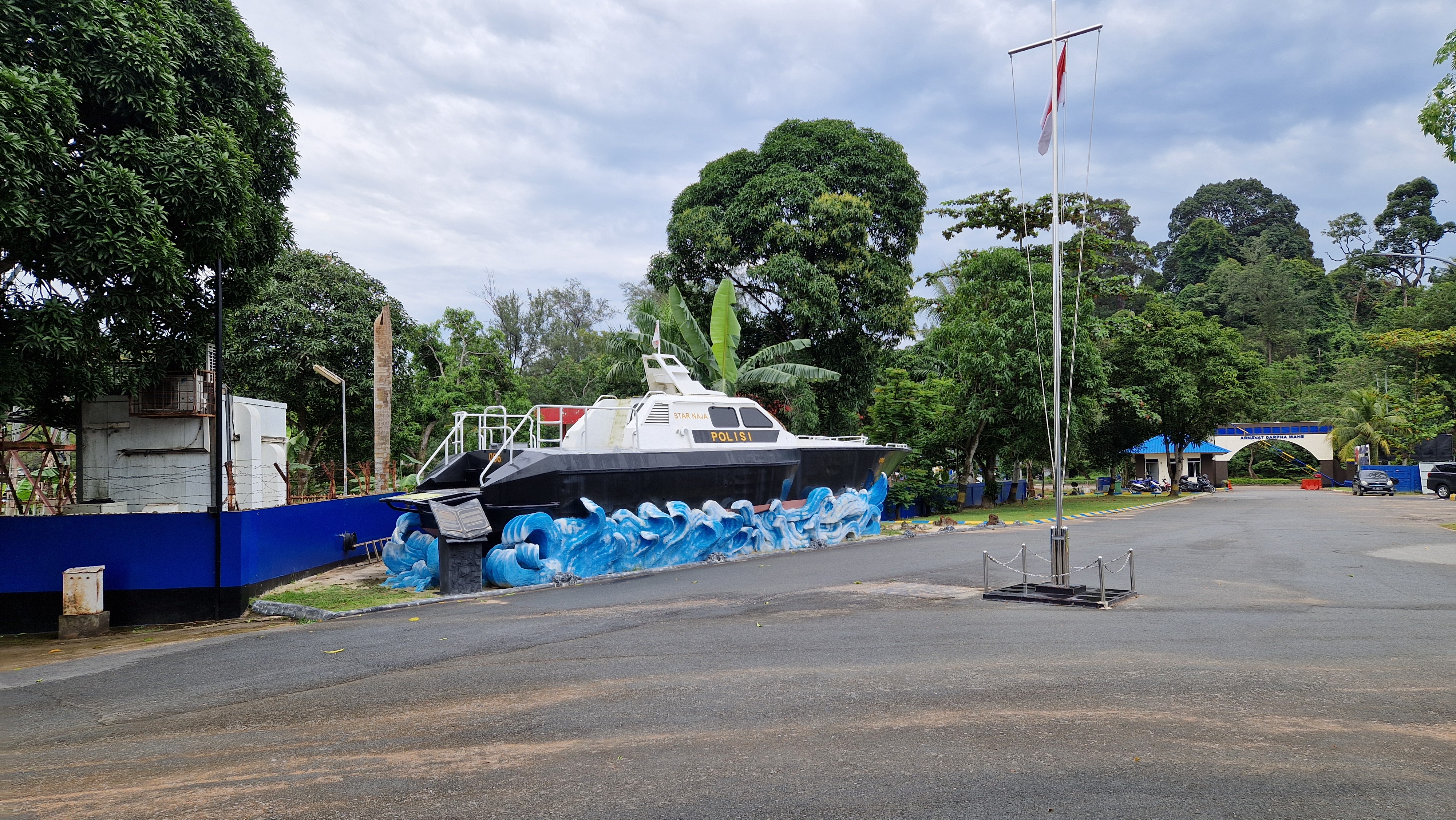 Picture of a Police boat docked on land