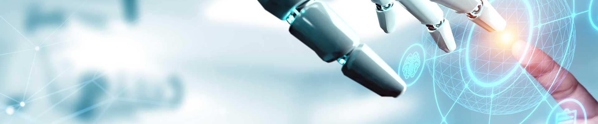 an android hand touching a human hand symbolising genesis of AI and coexistence