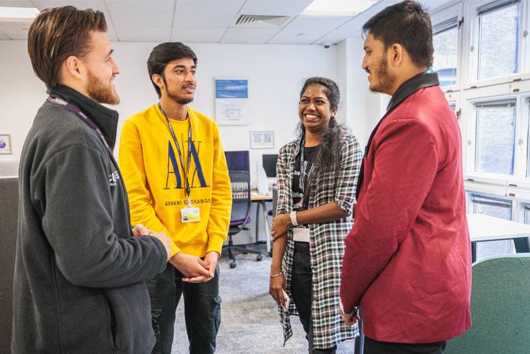 success coaches speaking to students at Coventry University London