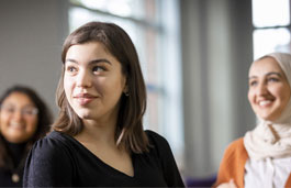 close up of students looking to the front of a classroom 