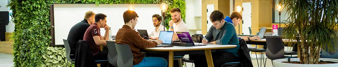 group of students studying in a break out area