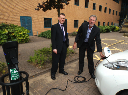 Day 2, (l-r): Dr David Jarvis (SURGE, Coventry University) and Mike Woollacott (Greenwatt) charging a Nissan Leaf outside the Technocentre, Coventry University.