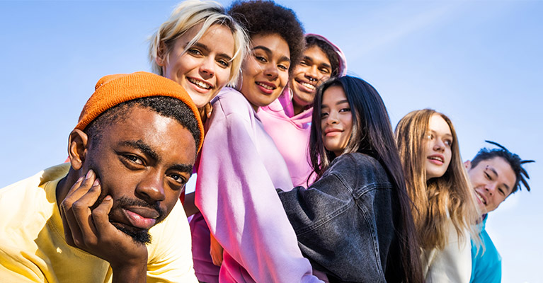 Students posing for a photo on a clear day