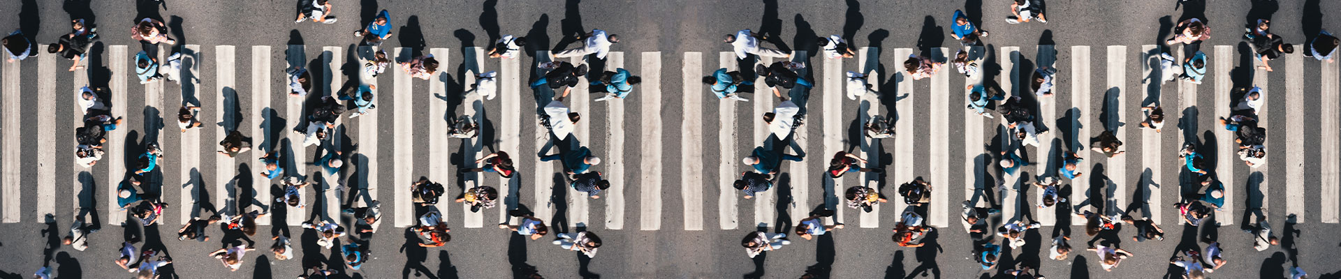 People crossing a zebra crossing