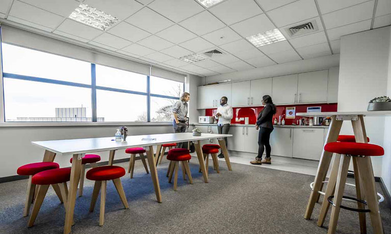 Three people in a room