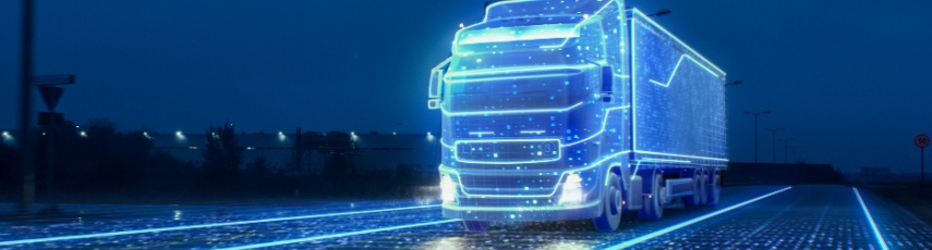 Futuristic Technology Concept: Autonomous Semi Truck with Cargo Trailer Drives at Night on the Road with Sensors Scanning Surrounding. Special Effects of Self Driving Truck Digitalizing Freeway