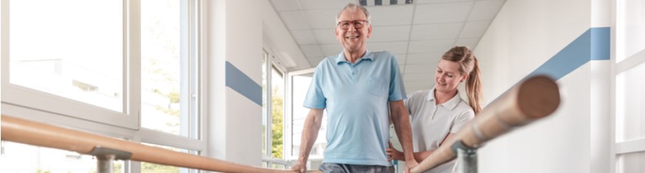 Senior Patient and physical therapist in rehabilitation walking exercises