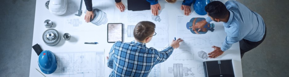 Team of Industrial Engineers Lean on Office Table, Analyze Machinery Blueprints, Architectural Problem Solving, Consult Project on Tablet Computer, Inspect Metal Component. Flat Lay Top Down View