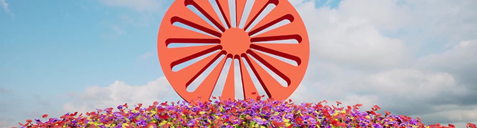 a wheel stands atop a flower-covered hill