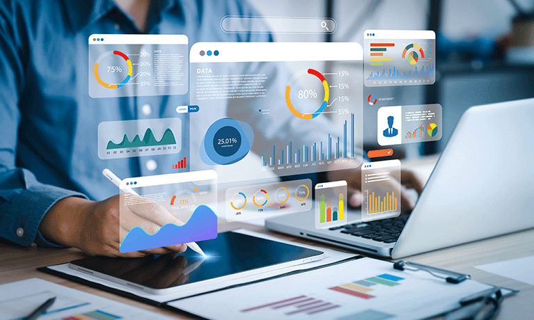 An analyst using a computer and dashboard for data business analysis