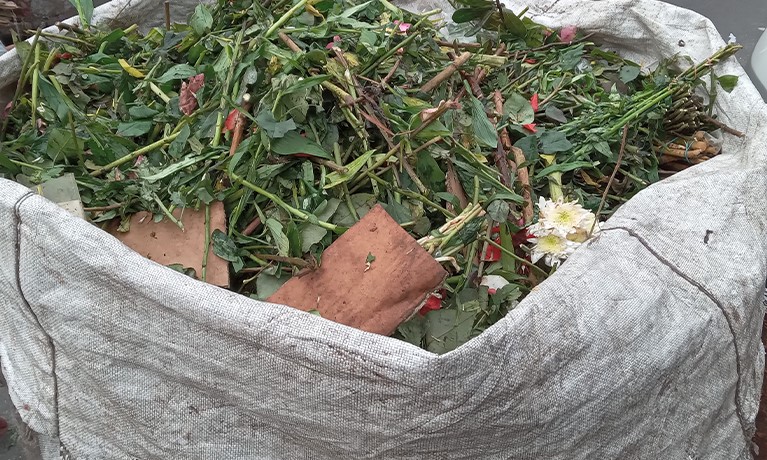 garden waste in a white sack