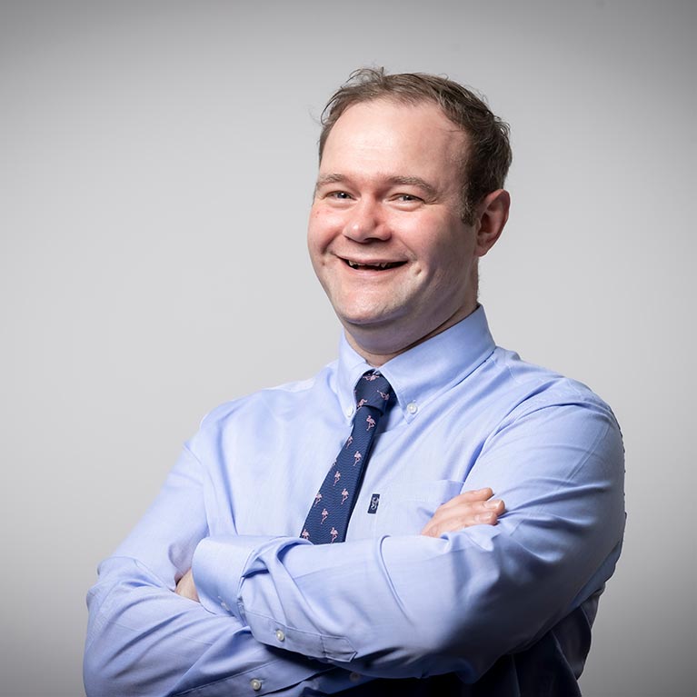 Joel Gibbs smiling during photoshoot