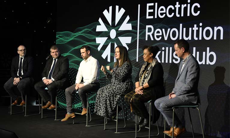 ERS Hub on stage at event in panel discussion