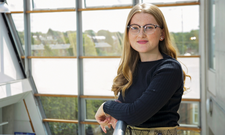 A woman smiling at the camera