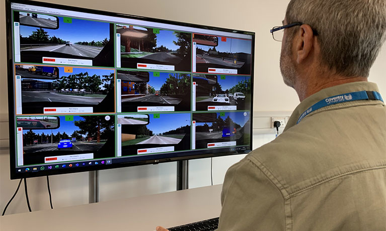 Researcher looking at screen