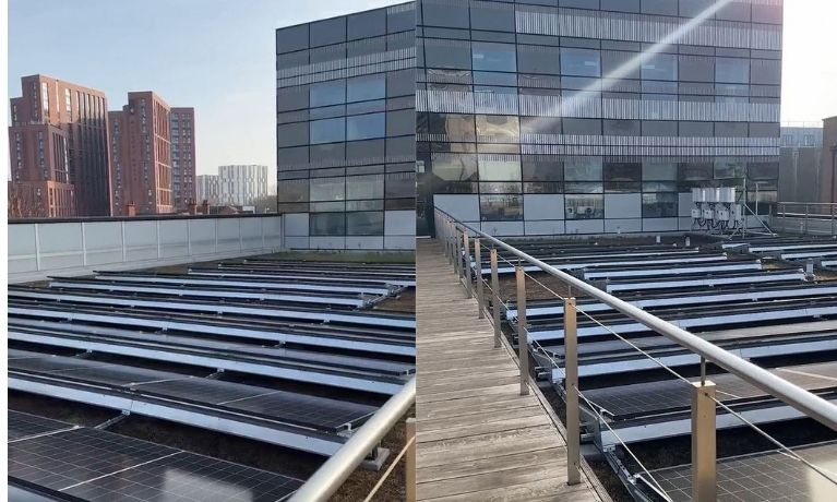 solar panels on a roof in a city