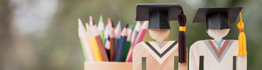 Wooden models wearing cap and gap.