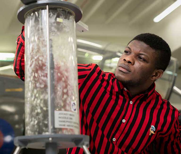 male student working in practical session