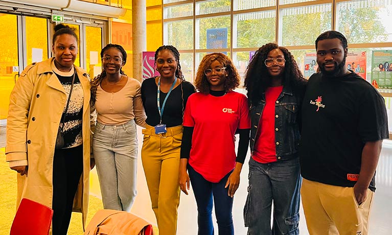 Group photo of everyone standing and smiling