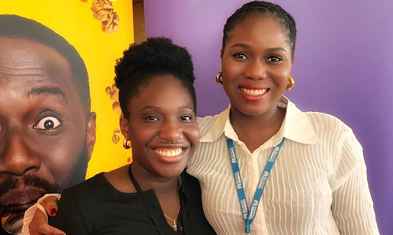 Hilda and a colleague smiling together