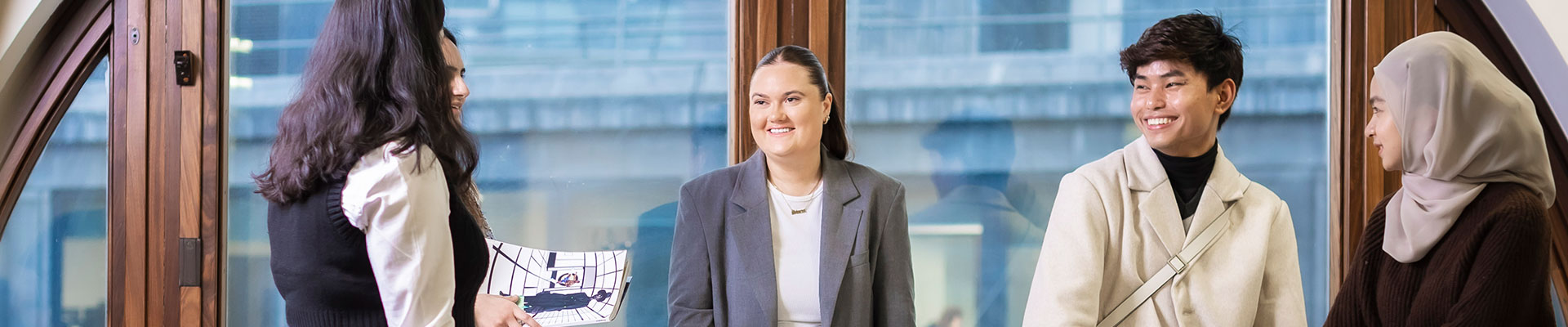 Students standing together in a social space