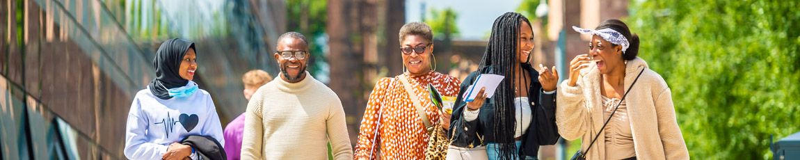 A family on campus at a Coventry University Open Day.