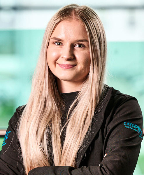 A woman having a conversation in a social setting