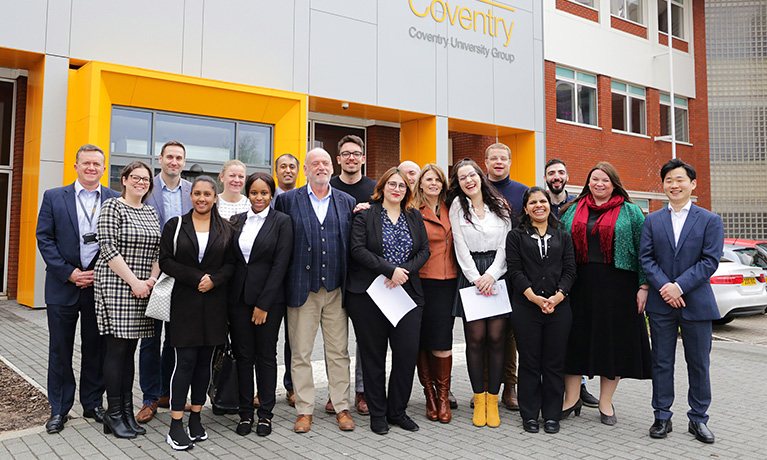 Tourism & Hospitality students with tutors and mentors outside the CU Coventry campus