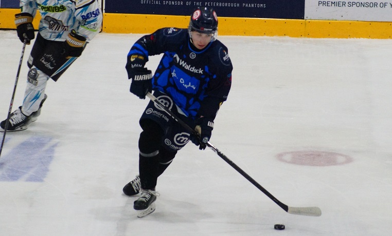 Barnabas playing ice hockey