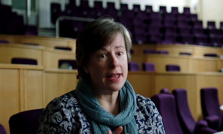 Picture of Natasha Taylor speaking against a blurred background