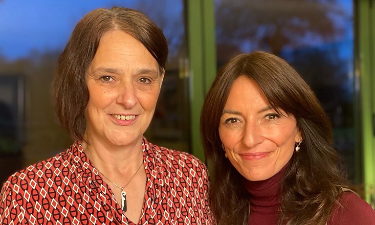 Liz Deutsch smiling at the camera alongside Davina McCall
