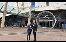 Two men shaking hands outside the O2 arena
