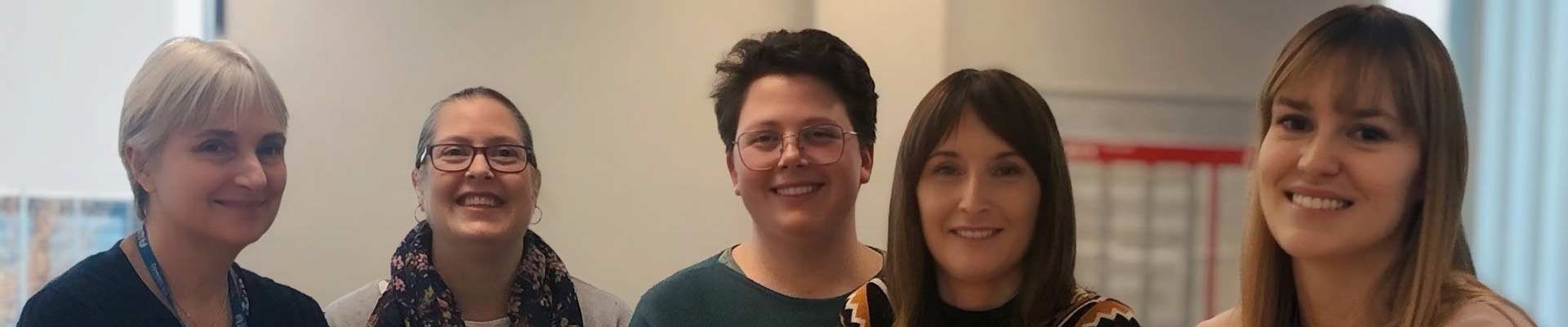 Student selection team 5 females sitting at a table