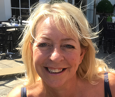 Angela Lalanne outside on a sunny day.