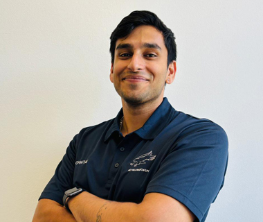 A profile photo of Himanshu with his arms crossed, smiling at the camera.