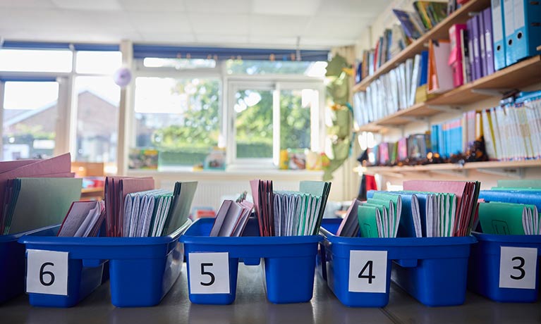 A teacher in a class teaching