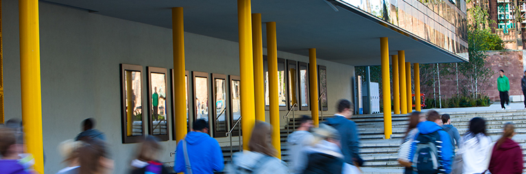Students walking outside of The Hub