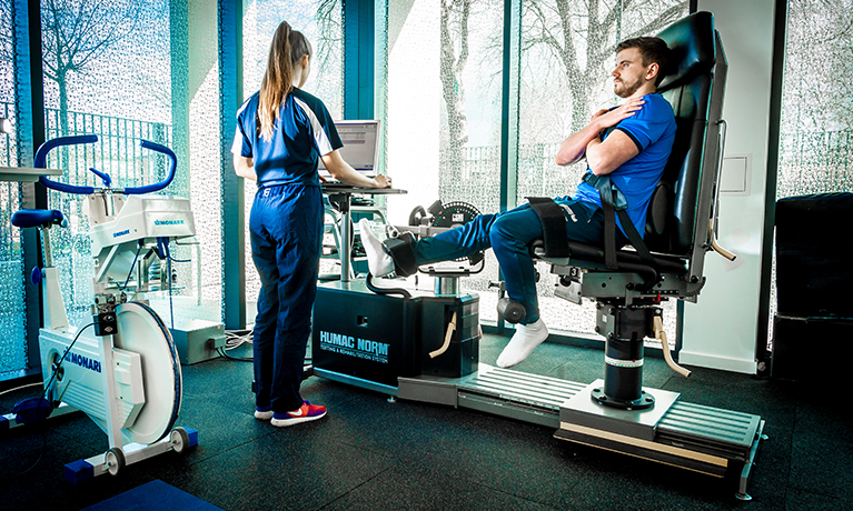 two sports science students in a sports lab