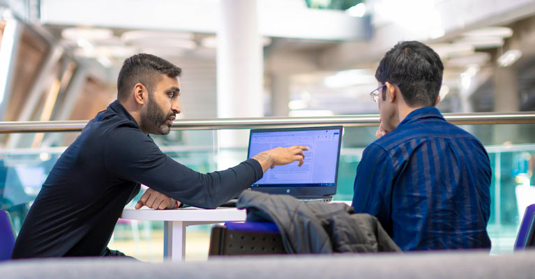 member of a talent team assisting a student